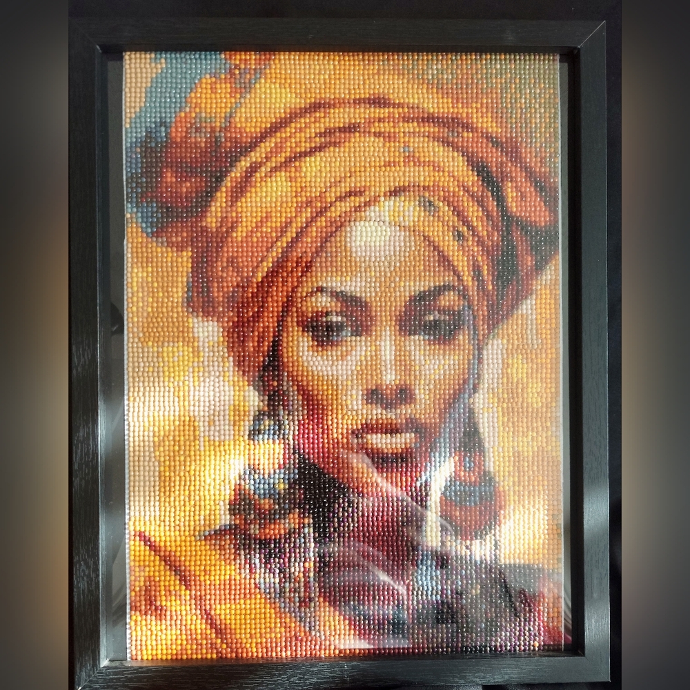 Vibrant Beaded Portrait Art in Black Frame